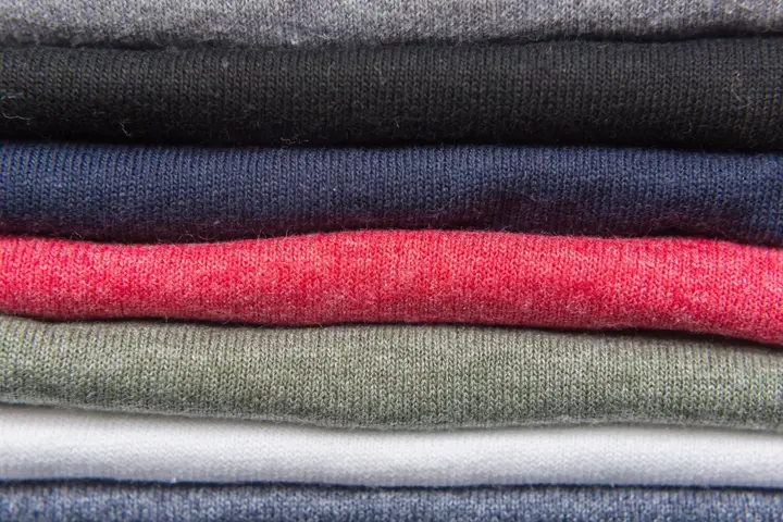 Folded t-shirts stack — Textile & Manufacturing, Lahore